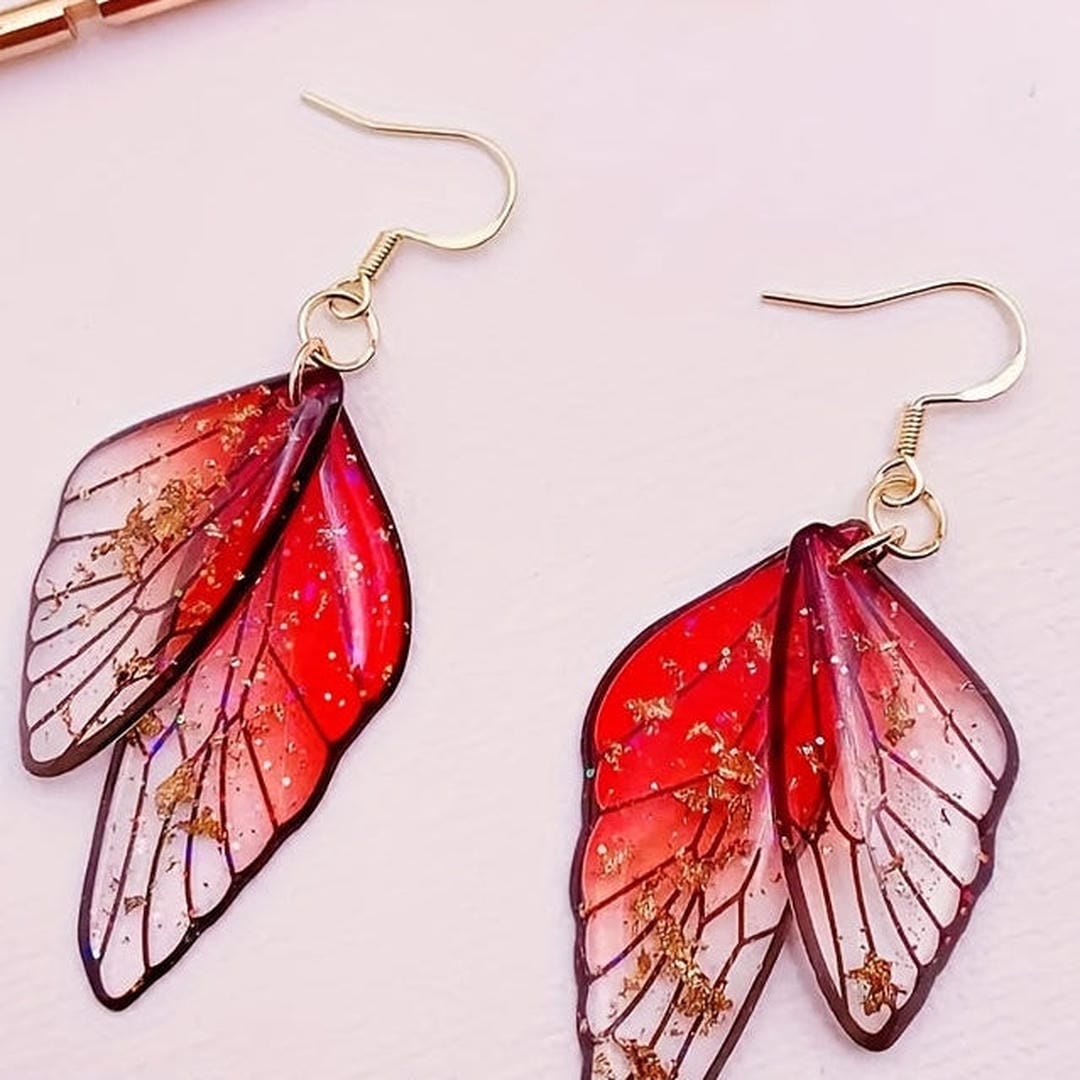 Pendientes largos de resina con alas de mariposa – imagen 4