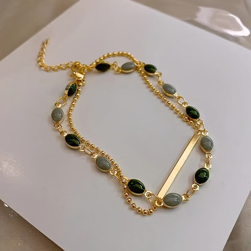 Pulsera dorada en capas de prestigio