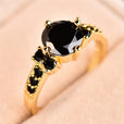 Exquisito anillo de circonita talla redonda con garras
