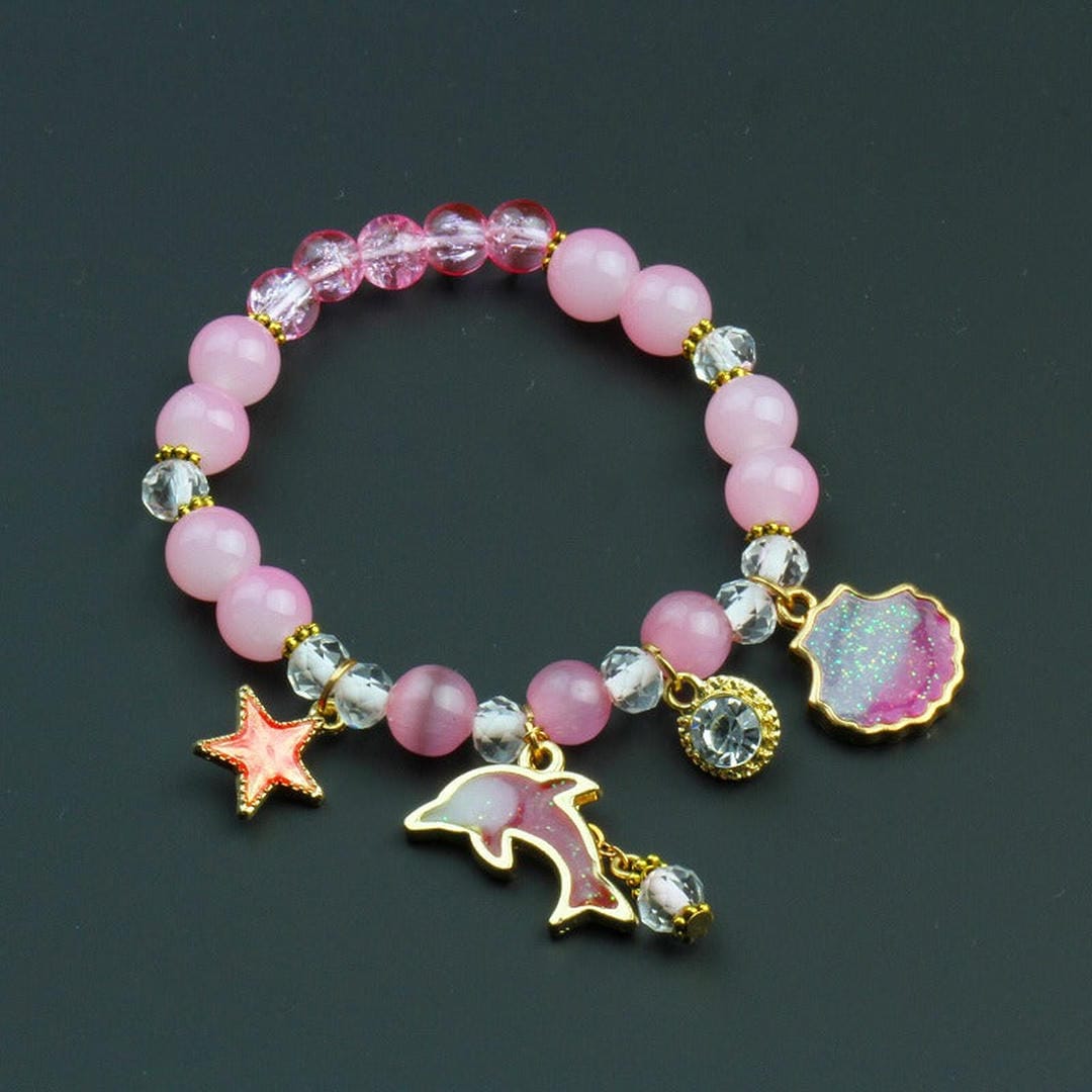 Pulsera de cuentas con dije de delfín y concha – imagen 2