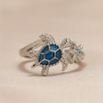 Anillo de tortuga marina y estrella de mar azul
