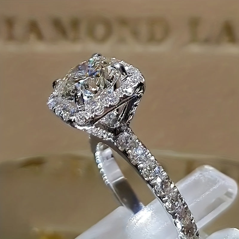 Anillo de oro blanco con circonitas incrustadas – imagen 2