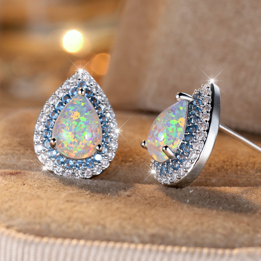 Pendientes 7.9k de ópalo azul con halo en forma de gota