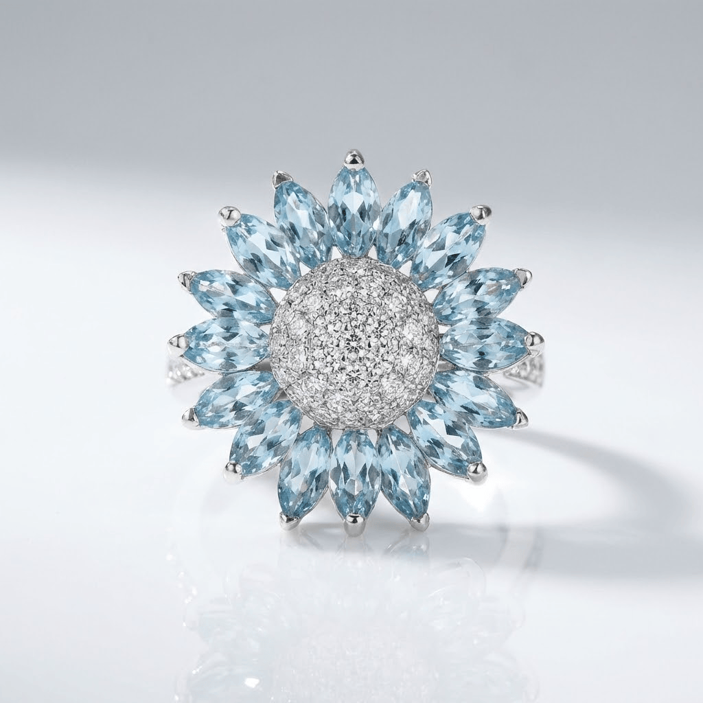 Anillo plateado con flor de topacio