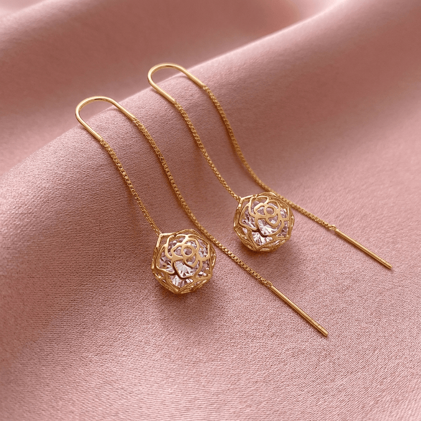 Pendientes delicados de gota dorada