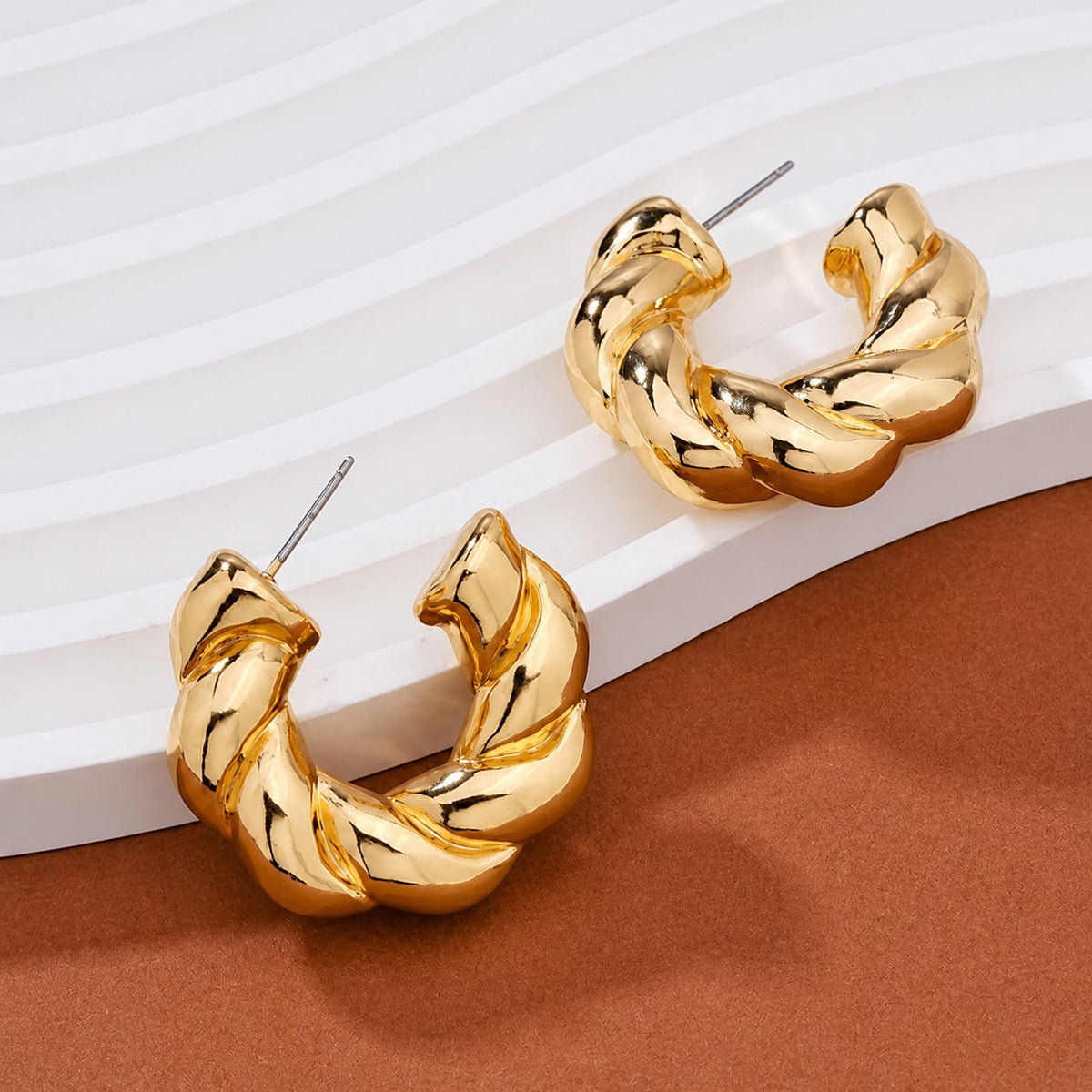 Pendientes de aro dorados y plateados