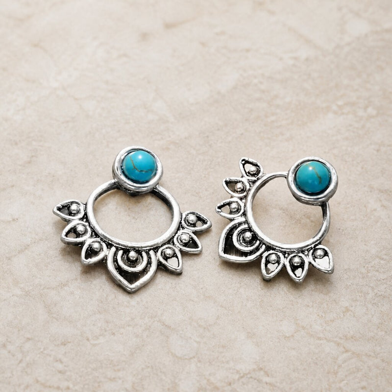 Pendientes exquisitos de gota en turquesa