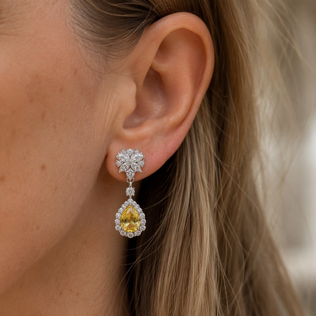 Pendientes exquisitos de gota amarilla