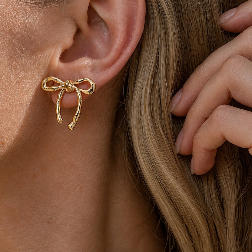 Pendientes llamativos de lazo Couture