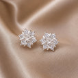 Pendientes de copo de nieve en oro blanco – imagen 2