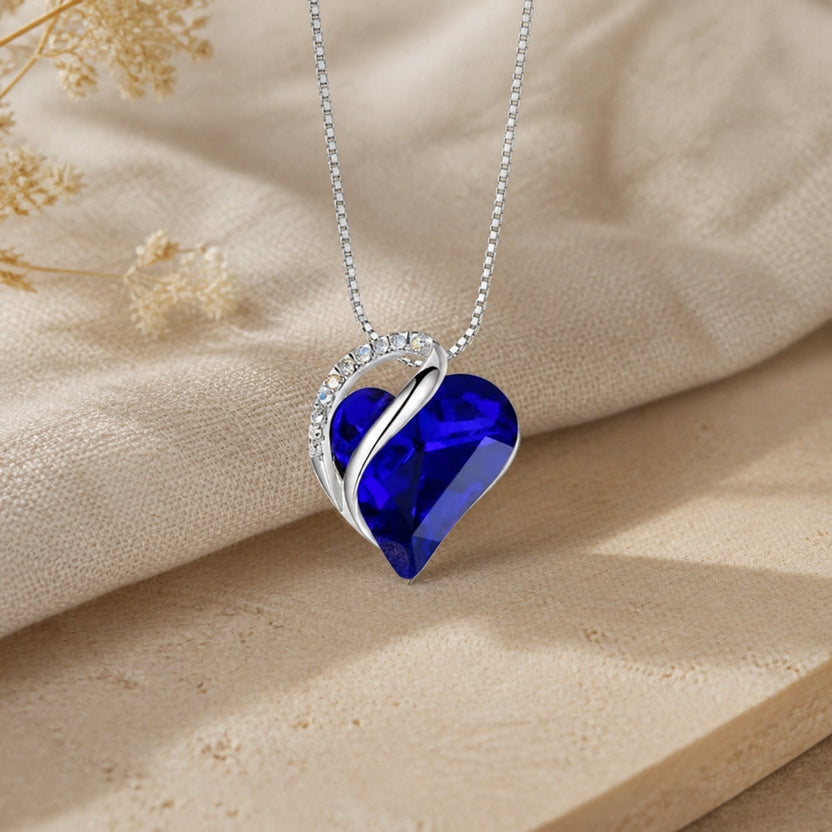 Collar de corazón infinito con zafiro