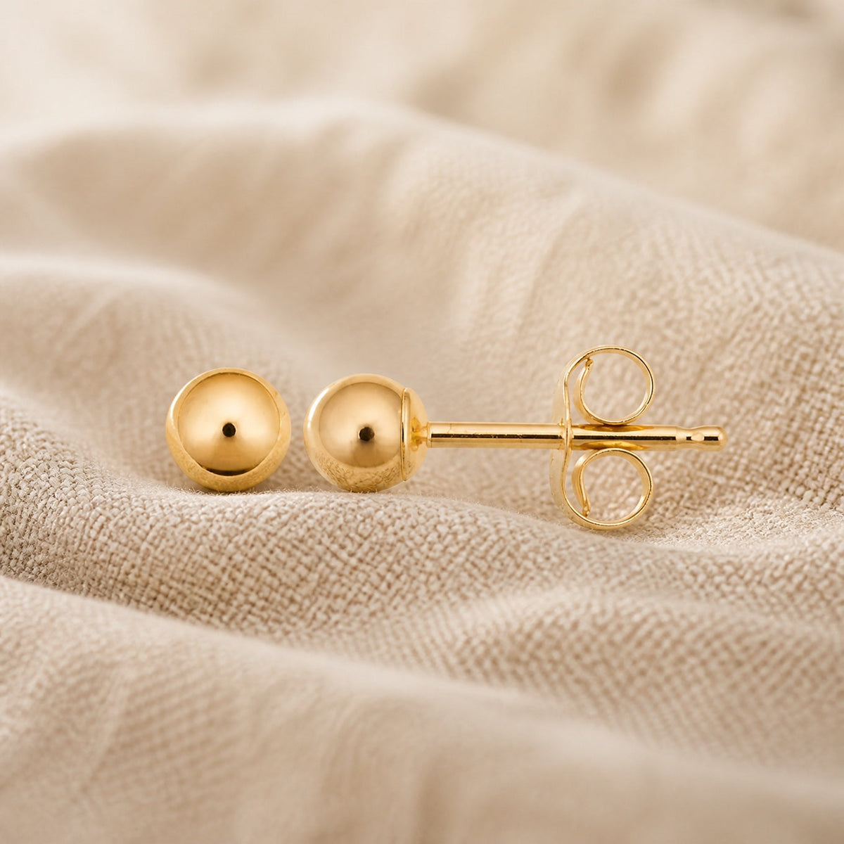 Pendientes de esfera pulida
