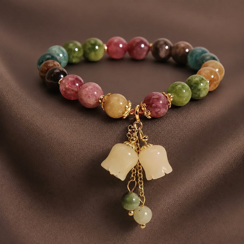 Pulsera radiante de jade con cuentas y dijes