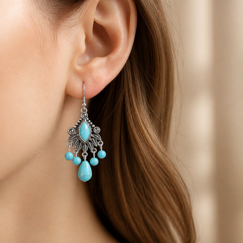 Pendientes largos de turquesa estilo lámpara con borla