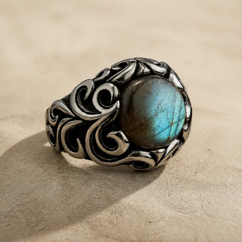 Anillo de plata con piedra ovalada en espiral