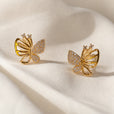 Pendientes mariposa hueca de circonita dorados – imagen 2