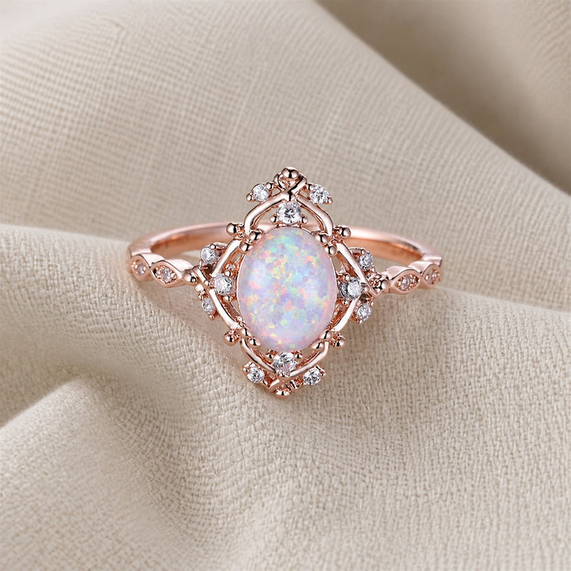 Anillo de flor con ópalo de fuego blanco y piedra ovalada