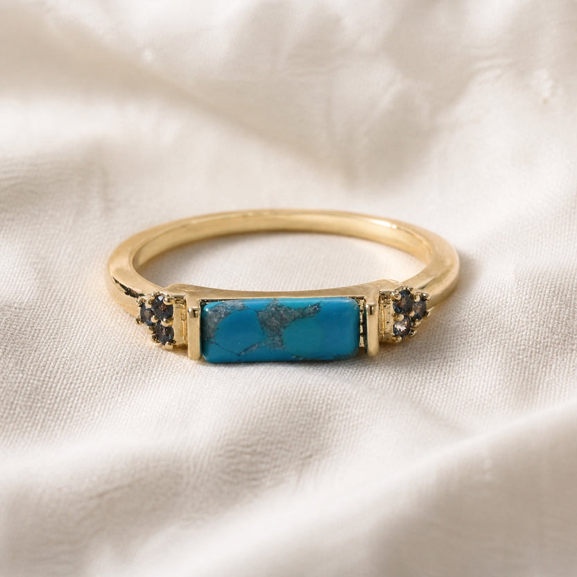 Anillo statement de oro con barra turquesa