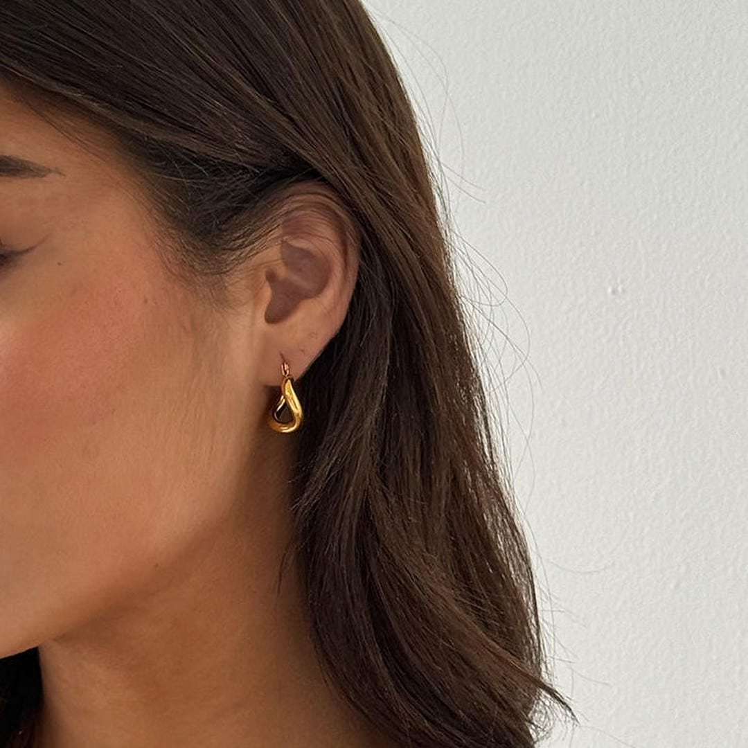 Pendientes elegantes de gota dorados – imagen 3