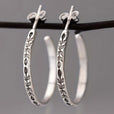 Pendientes de aro plateados elegantes