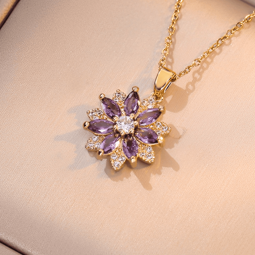 Collar con dije de flor y piedras preciosas