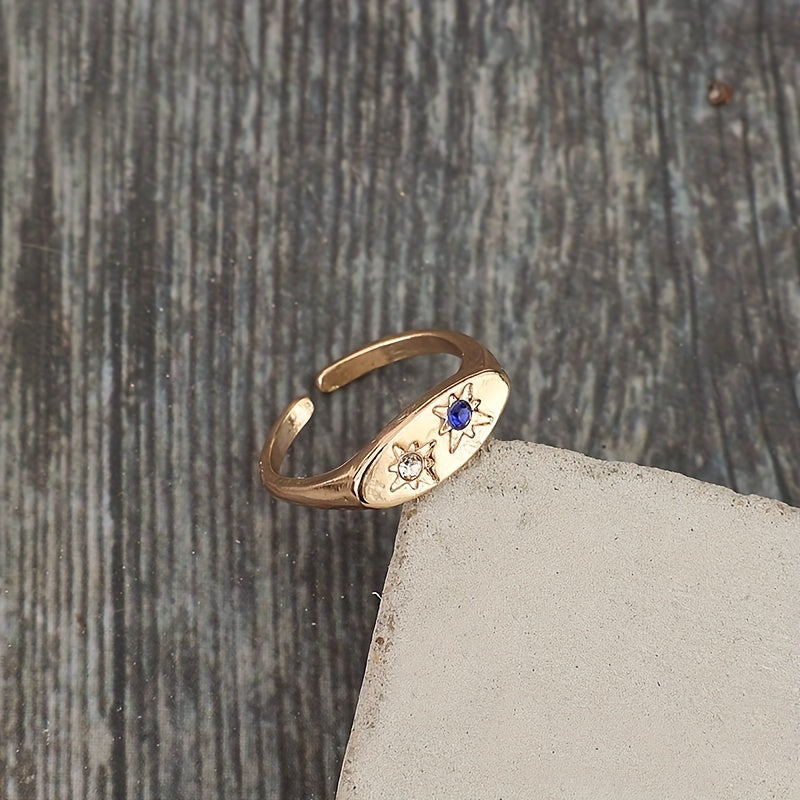 Anillo dorado minimalista plano y ovalado con resina