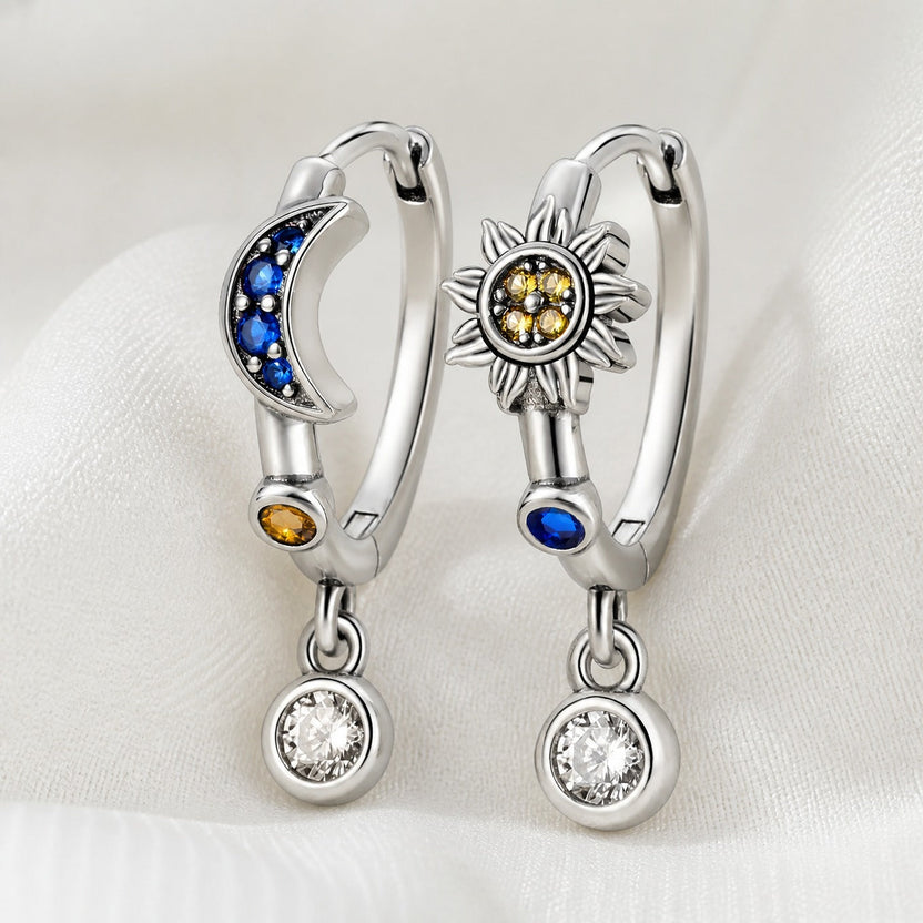 Pendientes opulentos con dije de zafiro