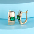 Pendientes huggie de aro con esmeralda