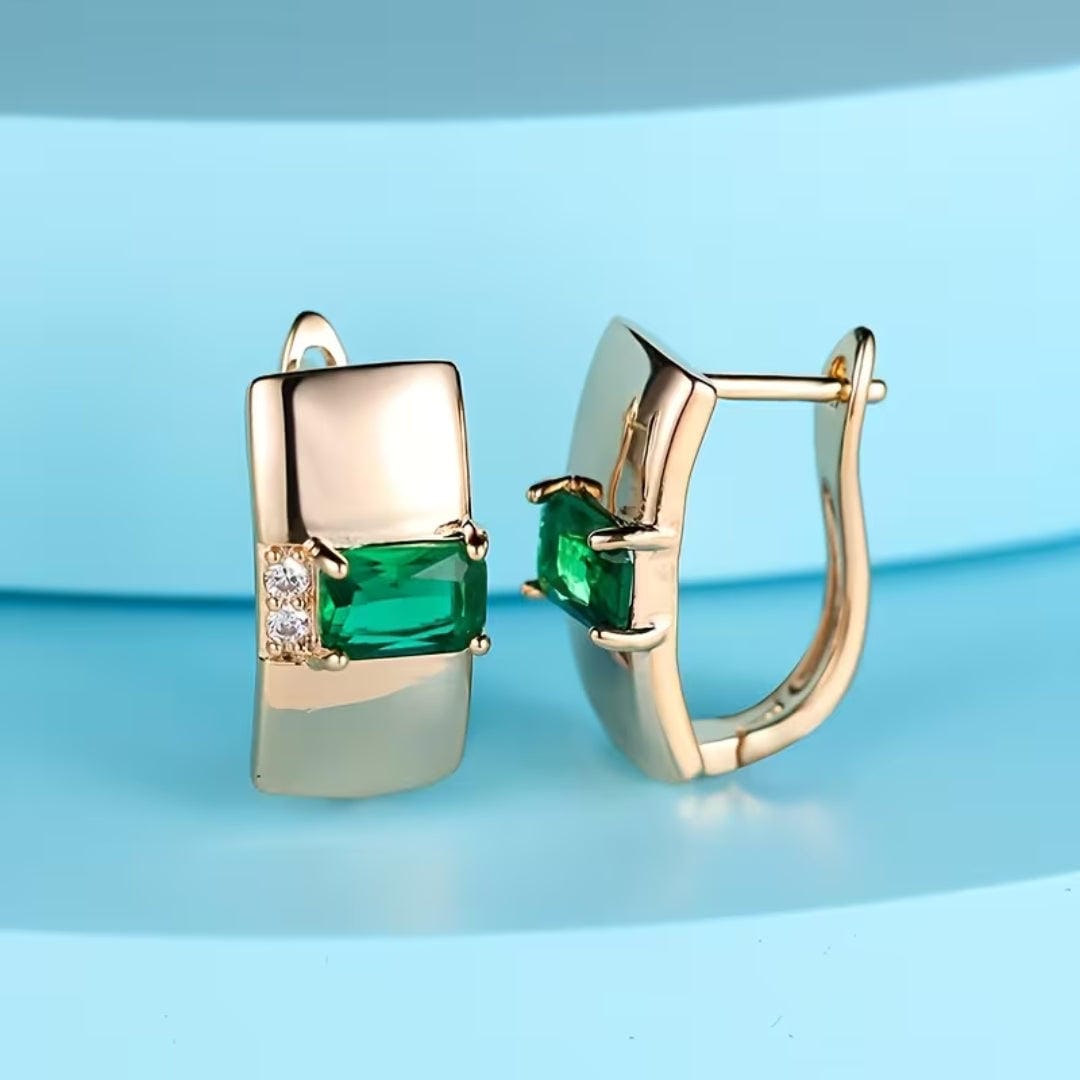 Pendientes huggie de aro con esmeralda