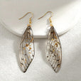 Pendientes largos de resina con alas de mariposa – imagen 2