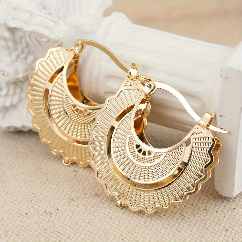 Pendientes circulares dorados atemporales