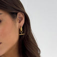Aros dorados Elegant con barra en T – imagen 3