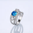 Anillo llamativo de plata con piedra azul