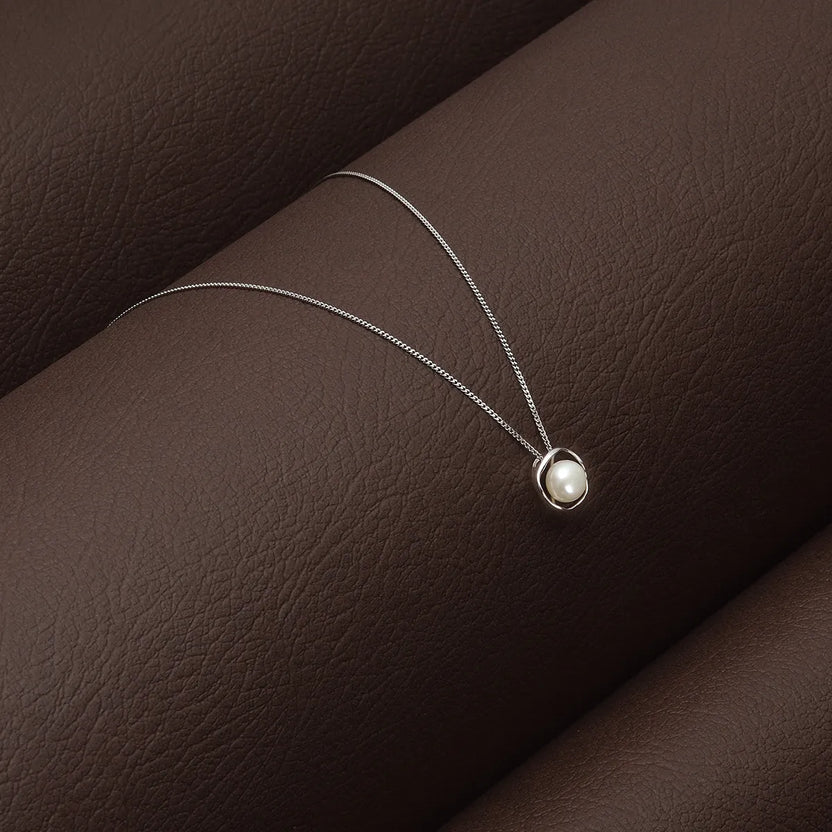 Colgante minimalista de perla flotante
