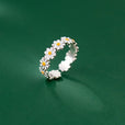 Anillo corona de margaritas llamativo