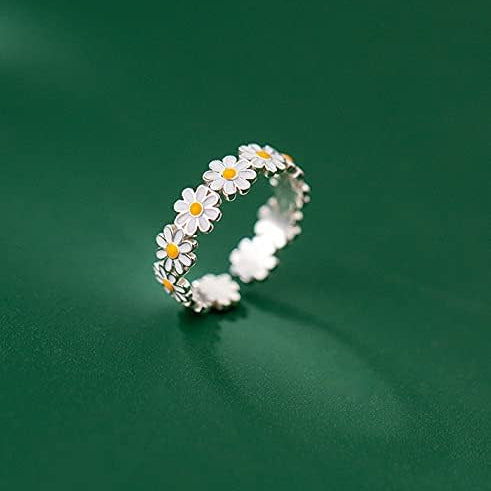 Anillo corona de margaritas llamativo