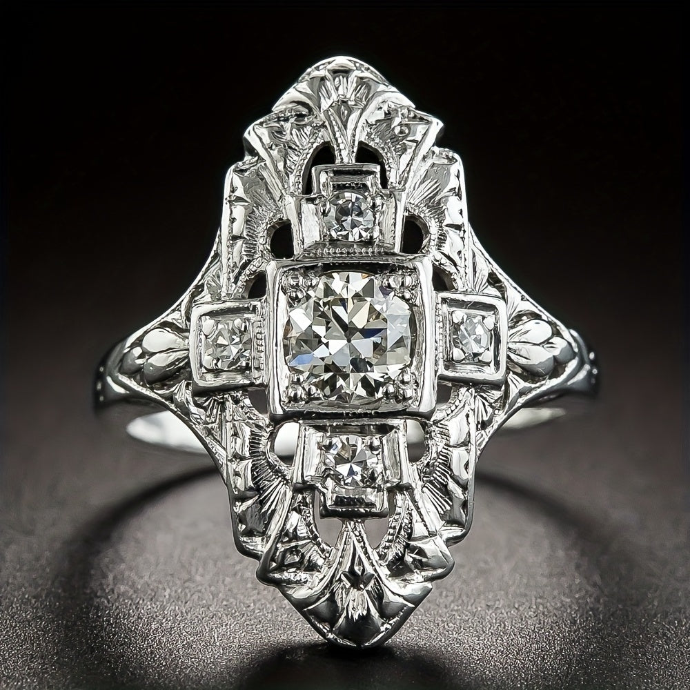 Anillo vintage calado con circonita incrustada