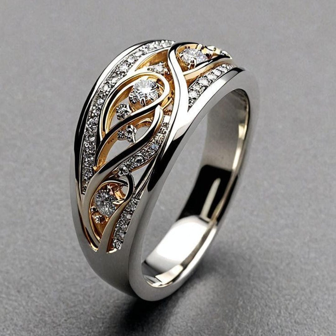Anillo escultórico dorado y plateado