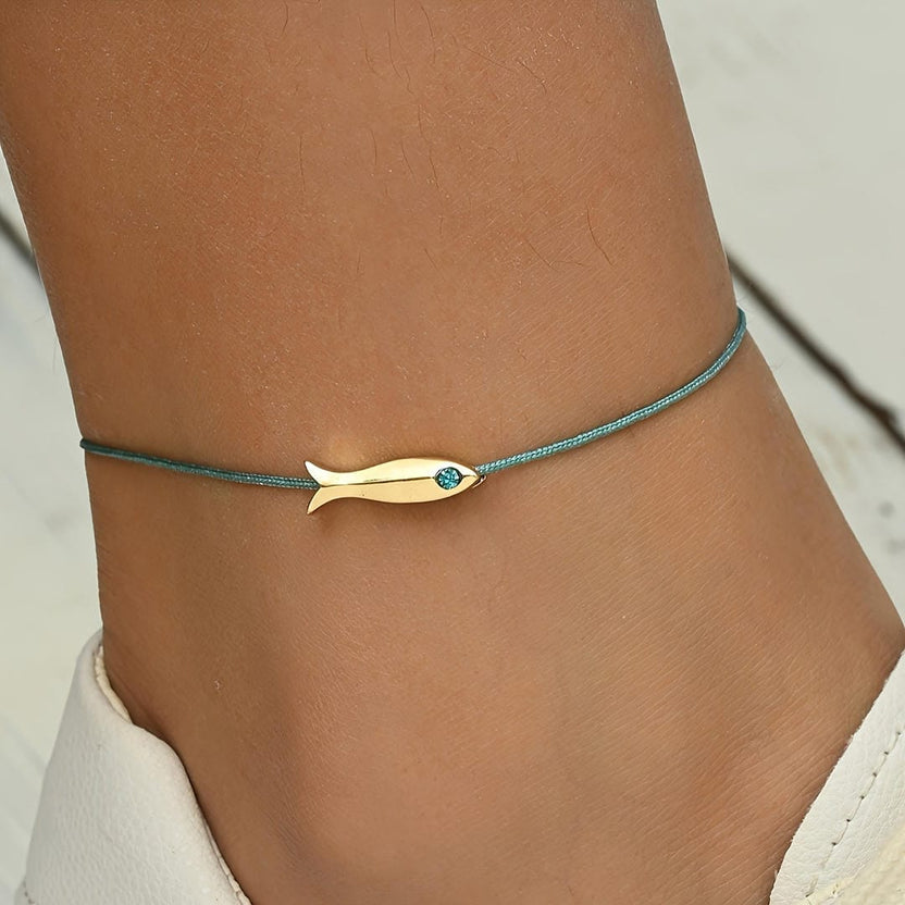 Tobillera dorada minimalista con cordón de pez