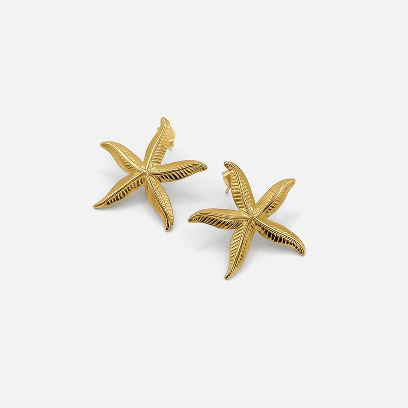 Pendientes elegantes de estrella de mar dorados