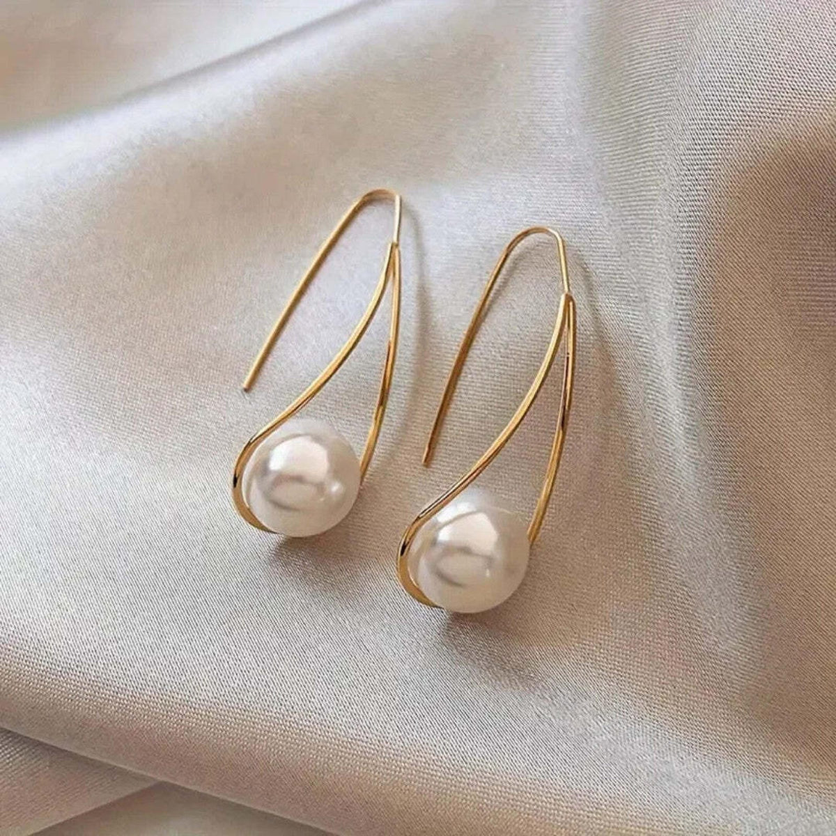 Pendientes colgantes de perla noble