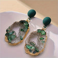 Pendientes huecos irregulares brillantes