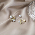 Ear cuff de perla con cola de ballena