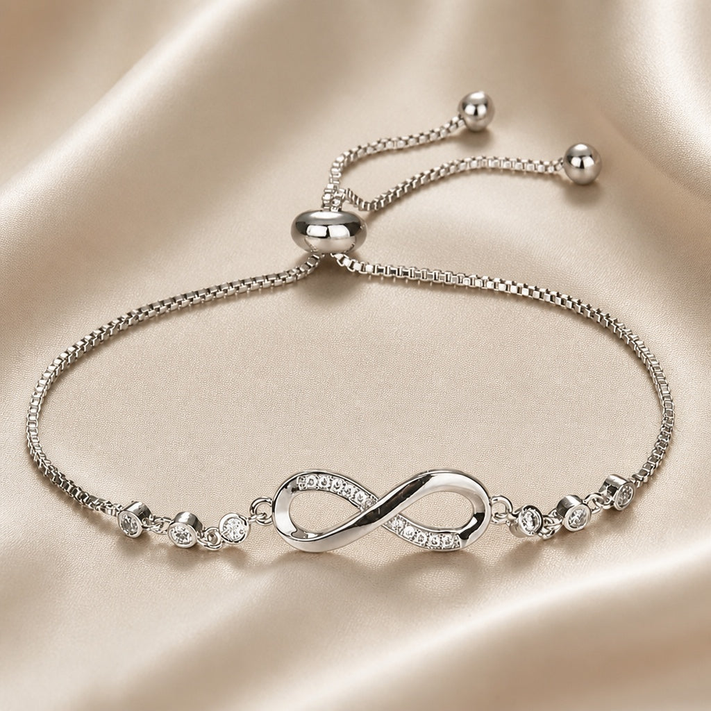 Pulsera deslizante de infinito en oro blanco
