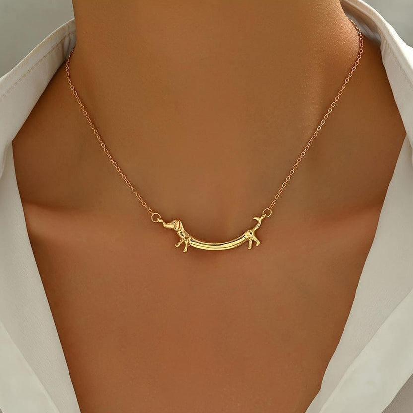 Collar con colgante de barra de perro salchicha