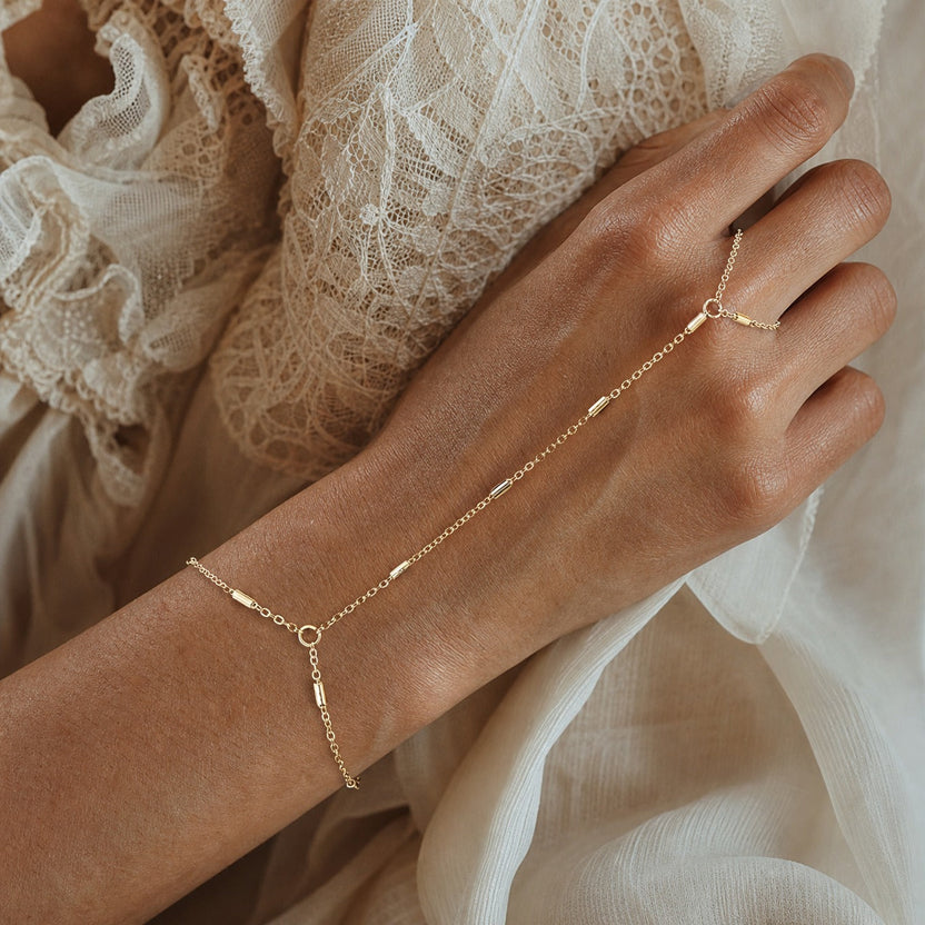 Elegante cadena de mano con cuentas