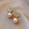 Pendientes elegantes colgantes de perla rosa – imagen 2