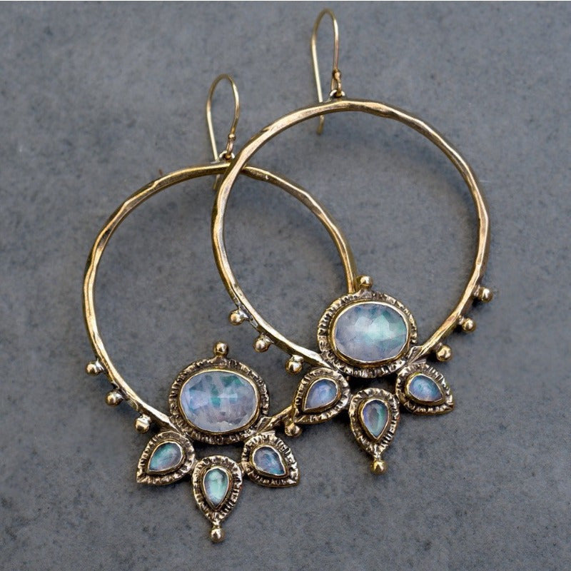 Pendientes de aro con piedra lunar y halo solar