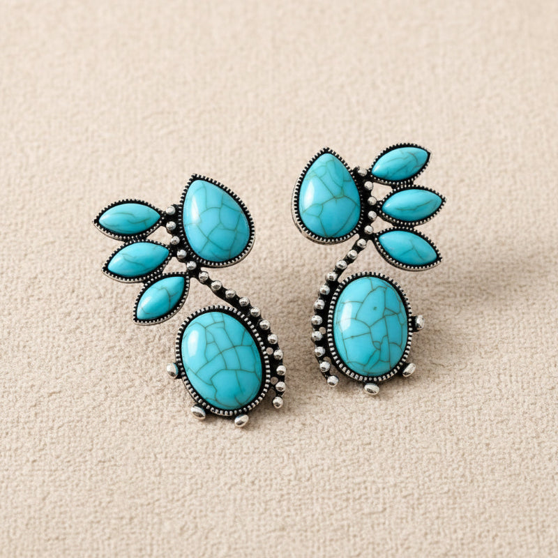 Pendientes florales geométricos en turquesa