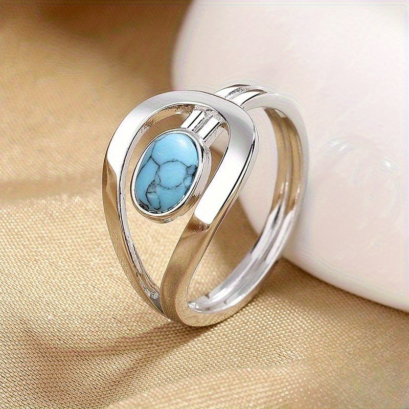 Anillo de oro blanco con turquesa
